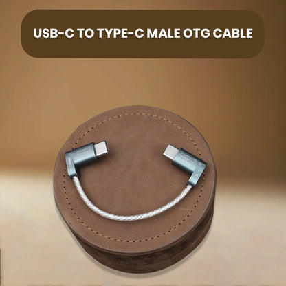 ddHiFi TC05L USB-C to USB-C OTG Cable displayed on a leather surface, ideal for audio connectivity and wide device compatibility.