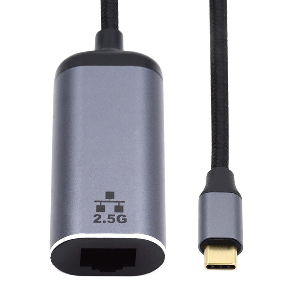 Close-up of TECPHILE Type-C to 2.5G Ethernet LAN Network Converter showing USB-C and RJ45 ports for fast Ethernet connectivity.