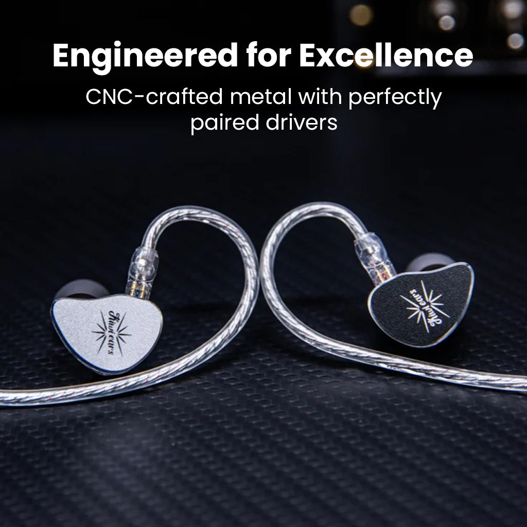 KiwiEars Belle IEMs in silver and black with CNC-crafted metal faceplates, engineered for premium audio clarity and durability.