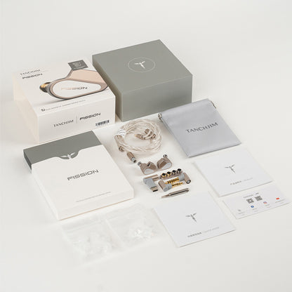 Complete unboxing of TANCHJIM Fission IEMs with accessories including cables, nozzles, carrying pouch, and user manuals.