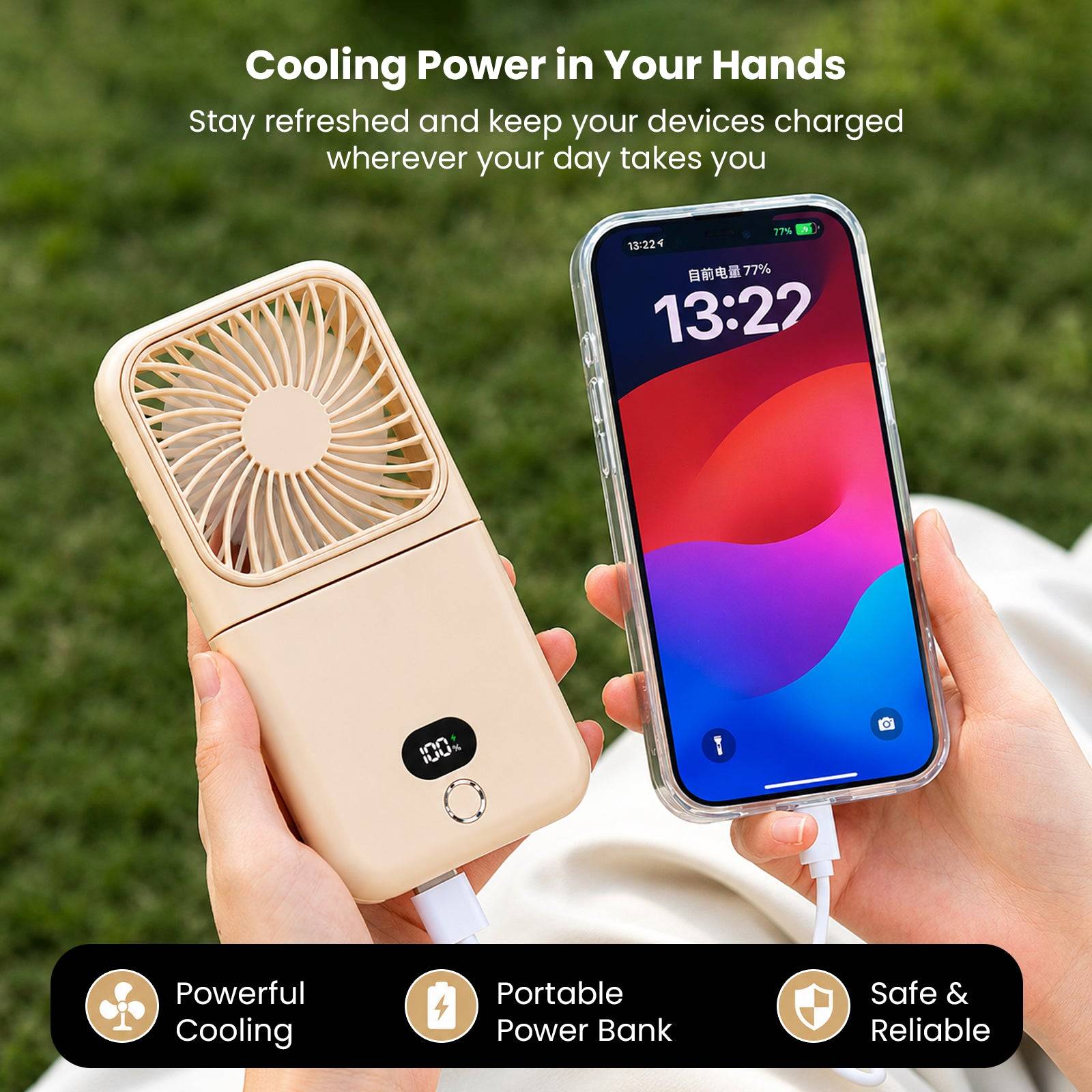 Person holding beige mini portable fan with LCD display and USB charging cable, demonstrating portable power bank feature outdoors