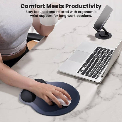User working at a desk with TECPHILE ergonomic mouse pad, demonstrating wrist support for enhanced productivity and comfort.