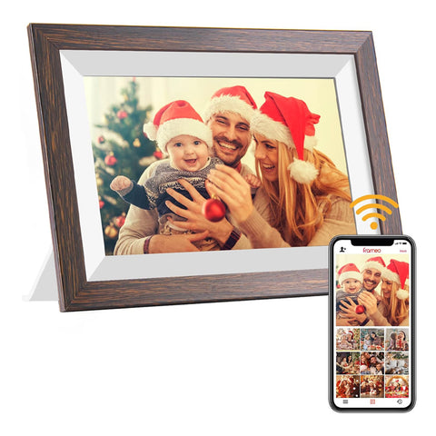 FRAMEO 32GB 10.1” Wi-Fi Digital Photo Frame displaying a family Christmas photo with app control for wireless sharing. Wood finish frame ideal for home decor.