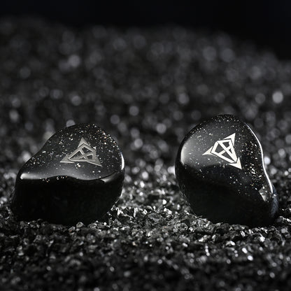 Close-up of Hisenior Mega7 IEMs featuring sleek black shells with silver logo, designed for audiophiles and professional musicians.