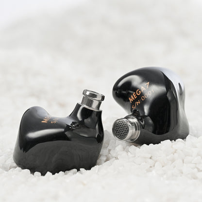 Detailed view of Hisenior Mega7 IEMs' nozzle and serial number, emphasizing high-end engineering and custom-fit design.