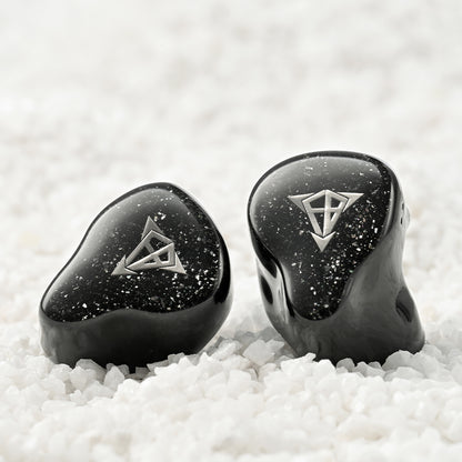 Front-facing Hisenior Mega7 IEMs with silver logo and starry black finish, crafted for immersive listening and stylish aesthetics.