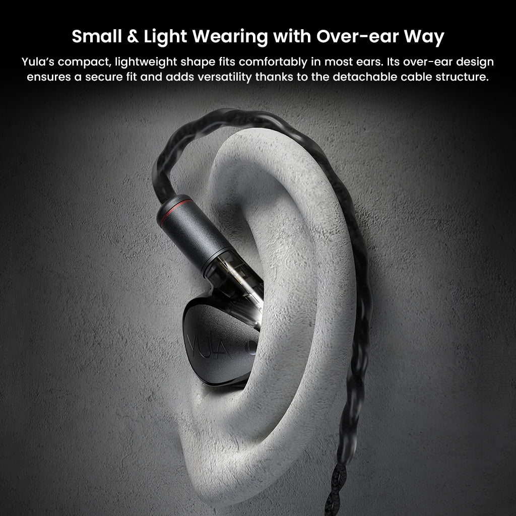 HiBy Yula IEM worn over-ear, demonstrating secure and lightweight fit ideal for extended listening sessions with detachable cable design.