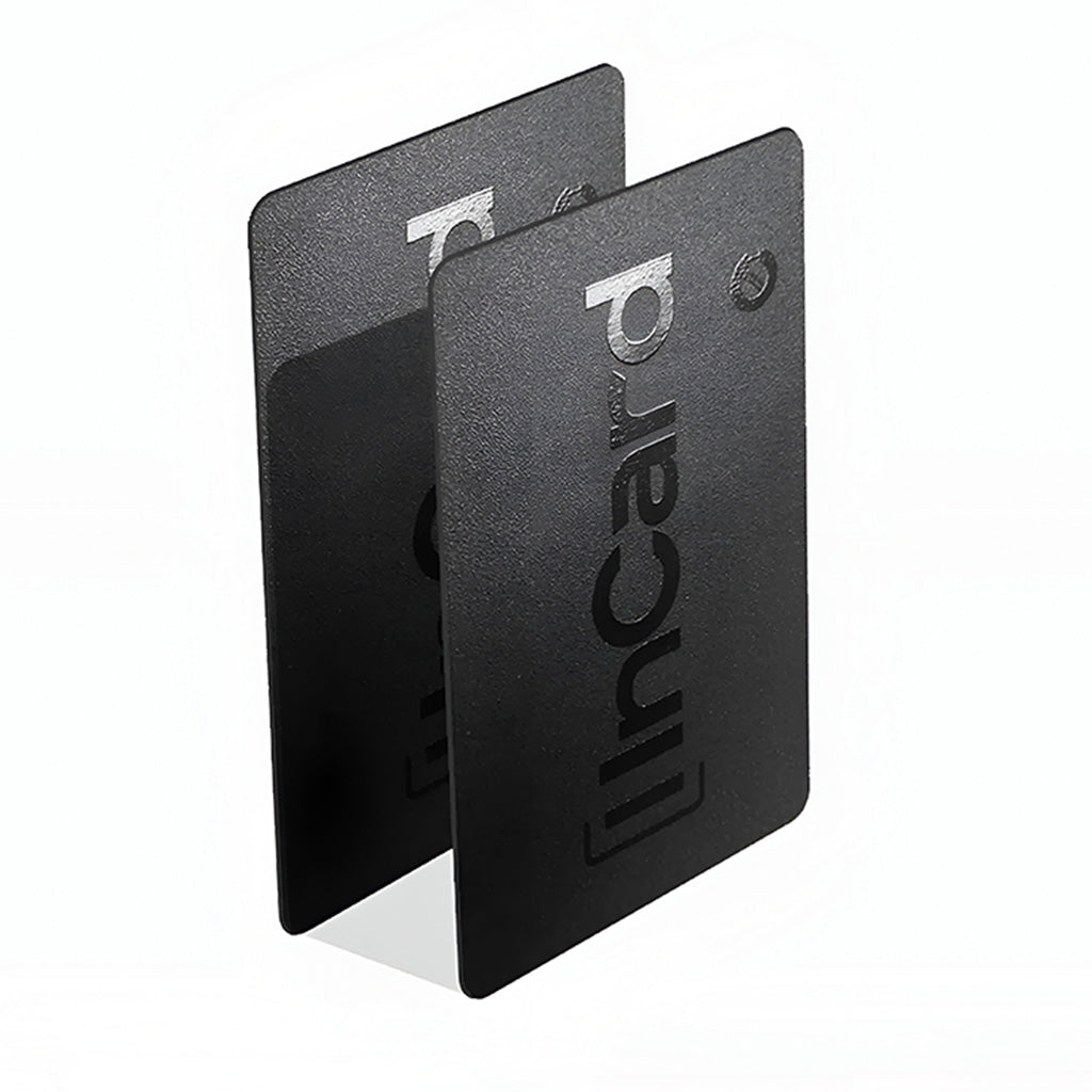 Two InCard Finder GPS Trackers standing upright, emphasizing slim, stackable design for multi-item tracking.