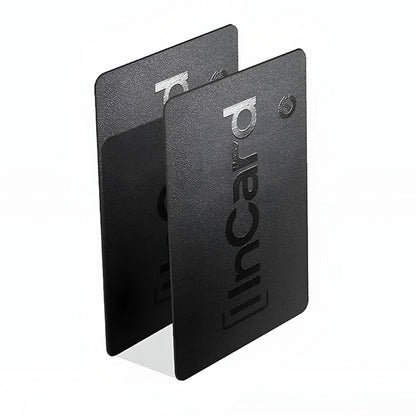 Two InCard Finder GPS Trackers standing upright, emphasizing slim, stackable design for multi-item tracking.