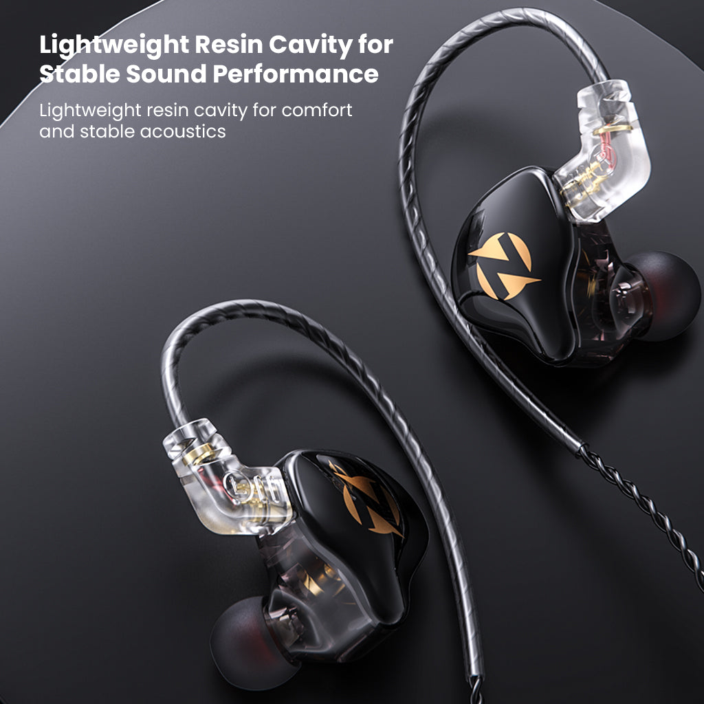 Black in-ear monitor with transparent resin cavity and gold logo