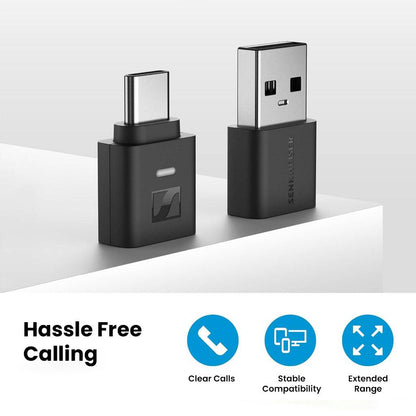 Sennheiser BTD - 700 Bluetooth USB Dongle on a desk, promoting clear calls, stable compatibility, and extended Bluetooth range.