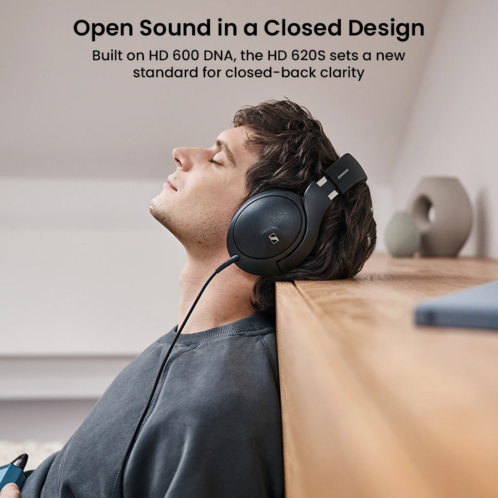 Man leaning back with Sennheiser HD 620S headphones, illustrating open sound clarity in a closed-back design inspired by HD 600 DNA.