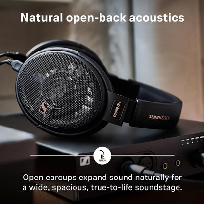 Sennheiser HD 660S2 open-back headphones connected to audio interface, delivering spacious, natural soundstage for immersive listening.