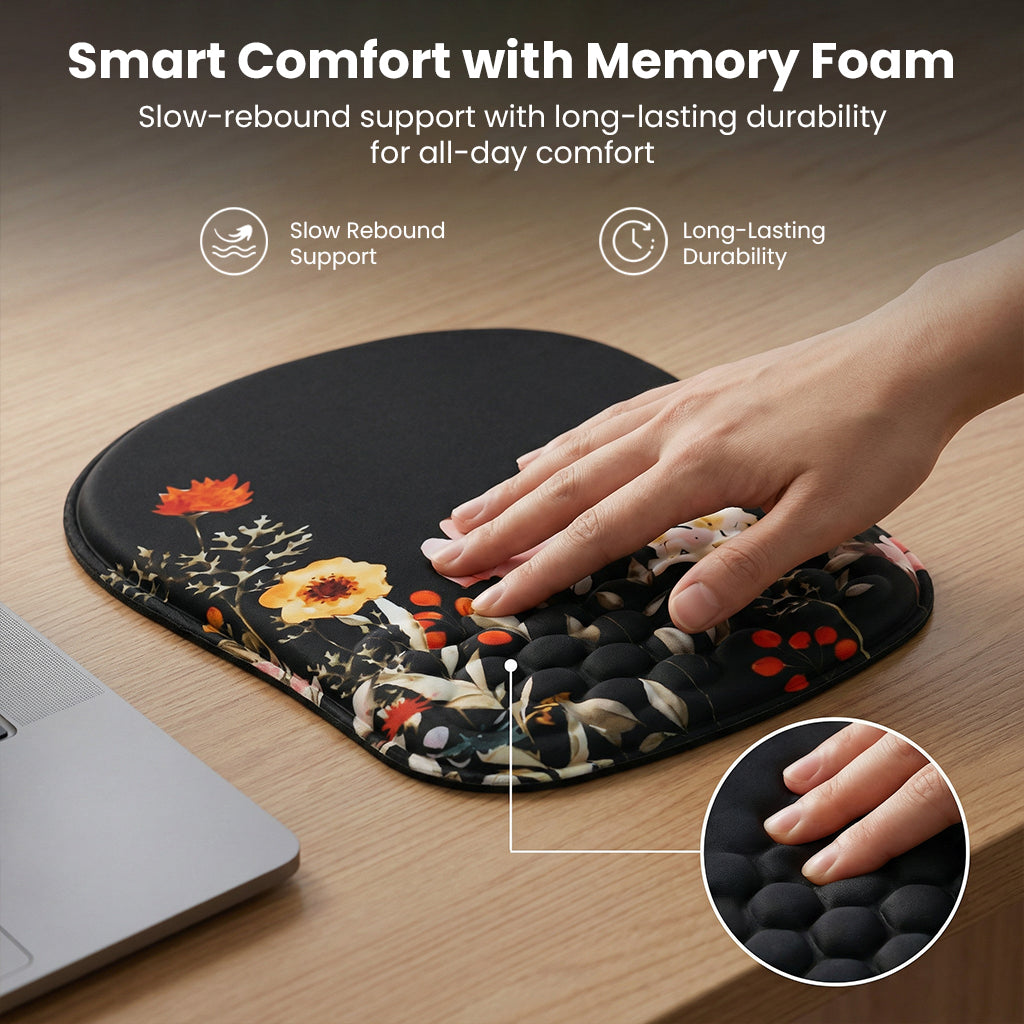 Close-up of memory foam wrist support on floral mouse pad