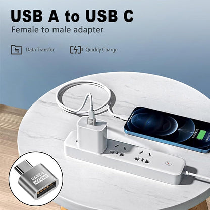 TECPHILE USB A to USB C OTG Adapter used for charging a smartphone via power strip, ideal for fast data transfer and quick charge.