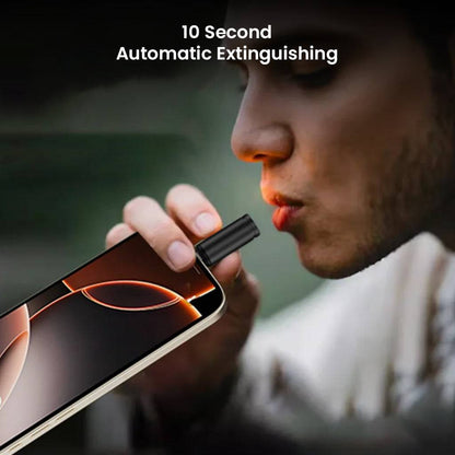 User blowing into TECPHILE-OTG Igniter Adapter connected to phone, demonstrating 10-second auto shut-off for safe windproof ignition.