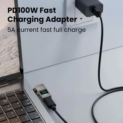 TECPHILE 100W fast charging USB-C to DC adapter plugged into wall socket, delivering 5A current for full-speed Dell laptop charging.