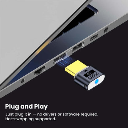 TECPHILE 4K HDMI Dummy Plug inserted into a laptop HDMI port, showcasing plug-and-play functionality with hot-swapping support.