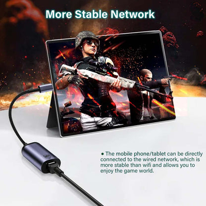 TECPHILE Type-C to 100Mbps Ethernet Adapter connected to a tablet for gaming, offering a stable wired network for lag-free gameplay and streaming.