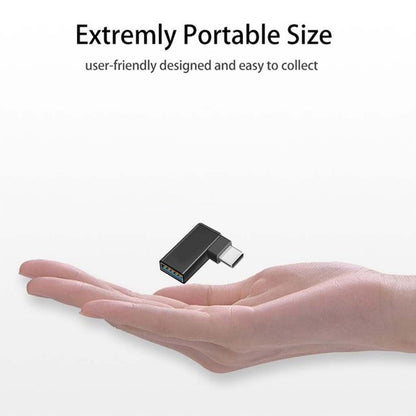 Extremely portable TECPHILE USB OTG Adapter fits in hand, ideal for on-the-go USB-C to USB-A high-speed data transfer.