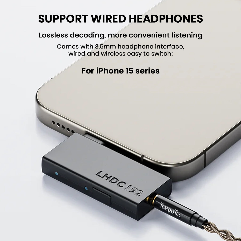 TempoTec LHDC ONE connected to iPhone 15 with 3.5mm wired headphones, supporting lossless decoding and easy switching.