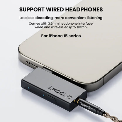 TempoTec LHDC ONE connected to iPhone 15 with 3.5mm wired headphones, supporting lossless decoding and easy switching.