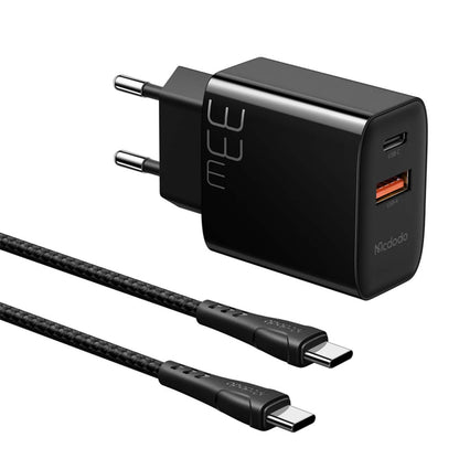Mcdodo 33W PD Gan Charger with dual USB-C and USB-A ports, includes braided Type-C to Type-C fast charging cable for phones and laptops.
