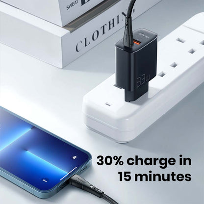 Mcdodo 33W PD Charger delivering 30% charge in 15 minutes to smartphone, ideal for quick power boosts on the go.