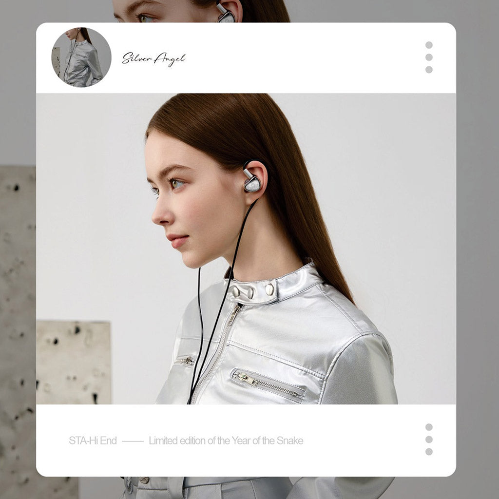 Model wearing Silver Angel STA-Hi End IEM, limited Year of the Snake edition, styled with futuristic silver outfit.