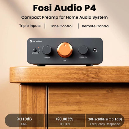 Fosi Audio-P4 Mini Preamp - Headphone Amplifier shown on a wooden desk, highlighting triple inputs, tone control, and remote compatibility for home audio.