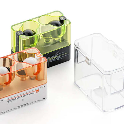 Moondrop Space Travel 2 cases in orange and green with earphones, plus empty clear case. Magnetic design for stylish audio gear storage.