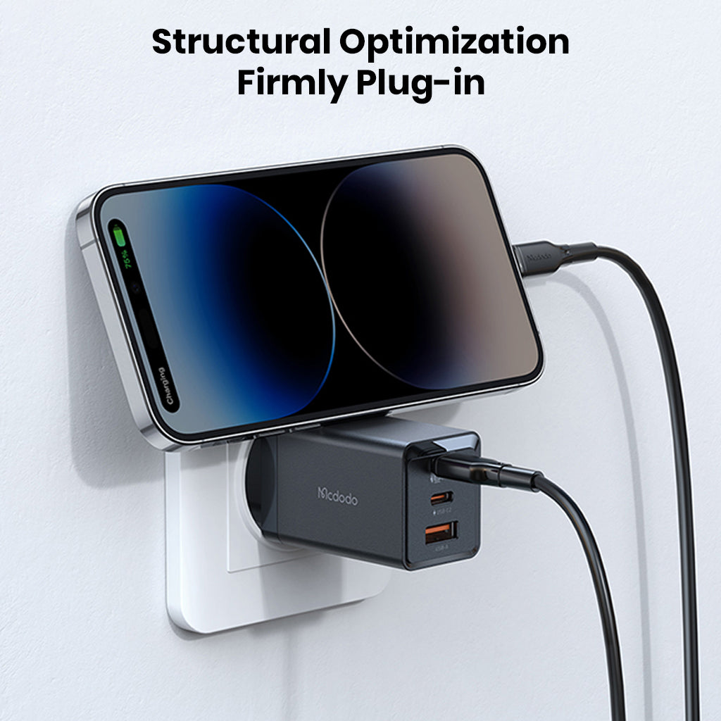 Mcdodo 67W GaN charger with structural optimization for firm plug-in and stable phone charging directly from the wall socket.