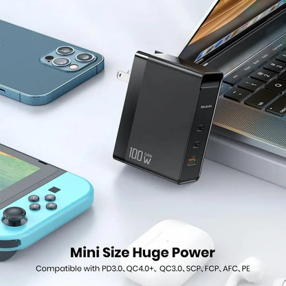 MCDODO 100W GaN charger powering multiple devices including laptop, smartphone, and gaming console with wide compatibility.