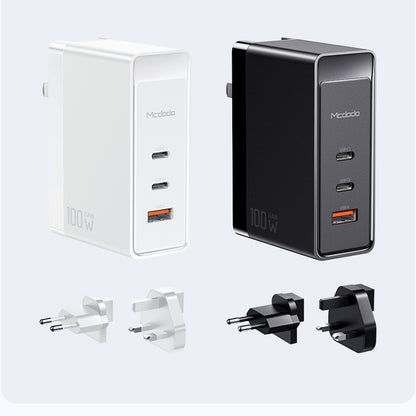 MCDODO 100W GaN charger available in black and white, includes EU and UK plug adapters for versatile use.