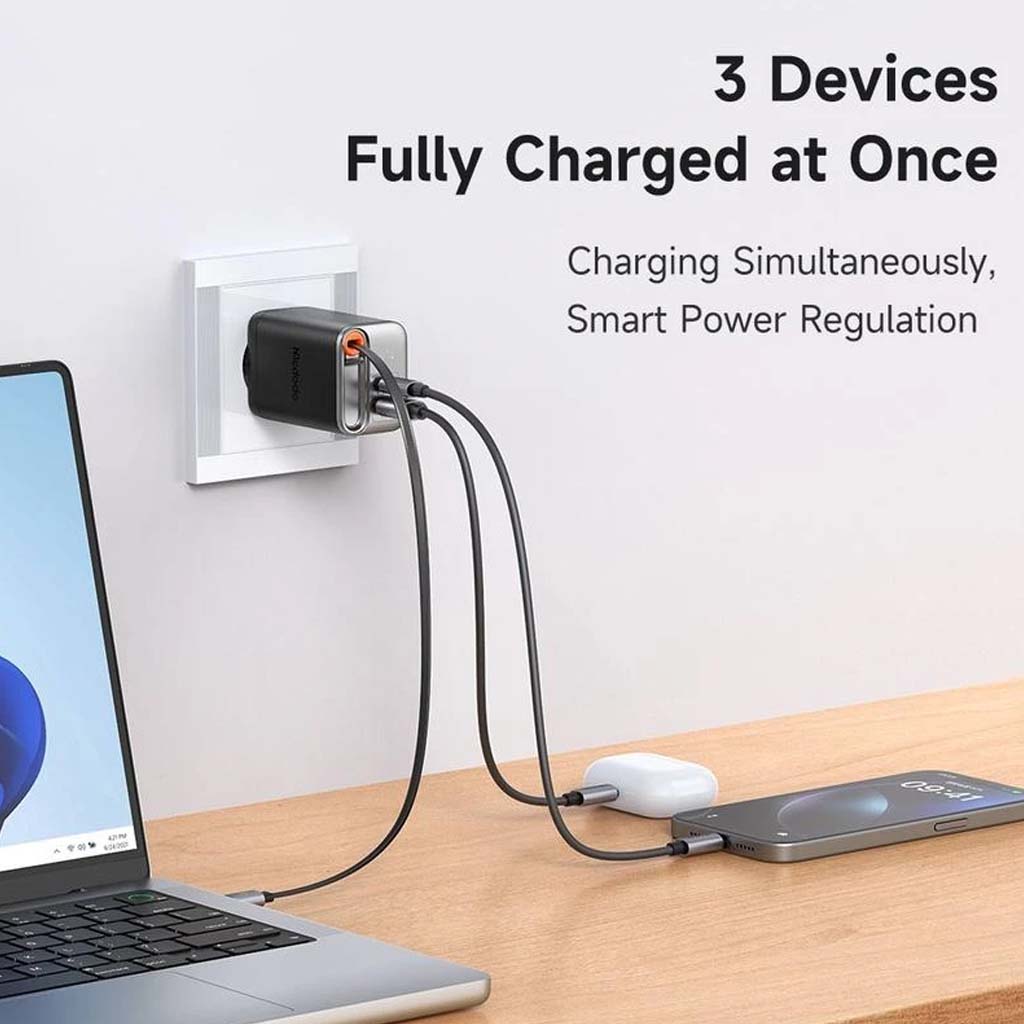 Charge three devices at once with Mcdodo 67W GaN Charger, featuring smart power regulation for efficient multi-device charging.