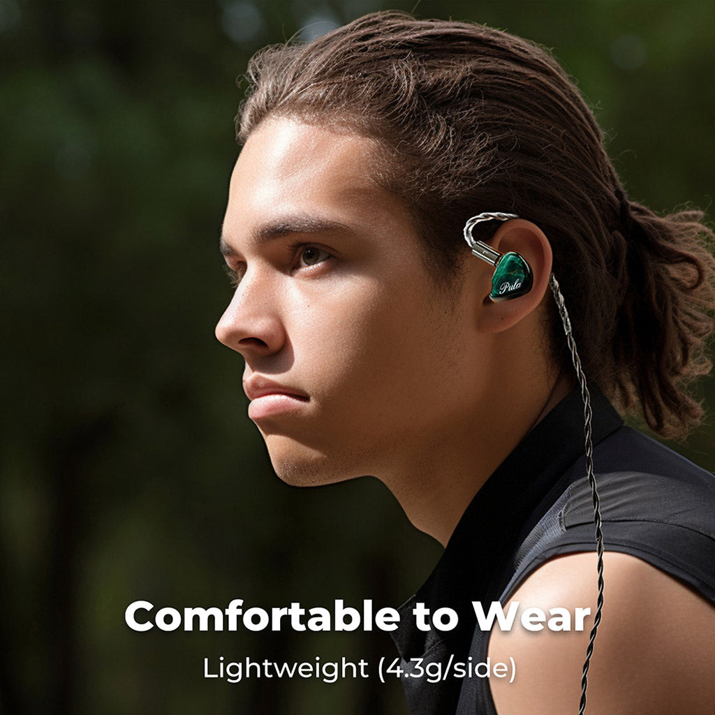 Man wearing PULA Unicrom IEM in green, emphasizing lightweight 4.3g design and ergonomic fit for extended listening comfort.