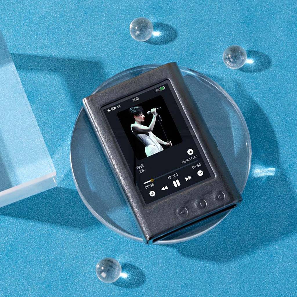 TempoTec Variations V3 player inside the PU leather case, displayed on a clear stand with music playing, highlighting full screen and button access.