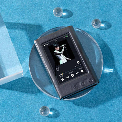 TempoTec Variations V3 player inside the PU leather case, displayed on a clear stand with music playing, highlighting full screen and button access.