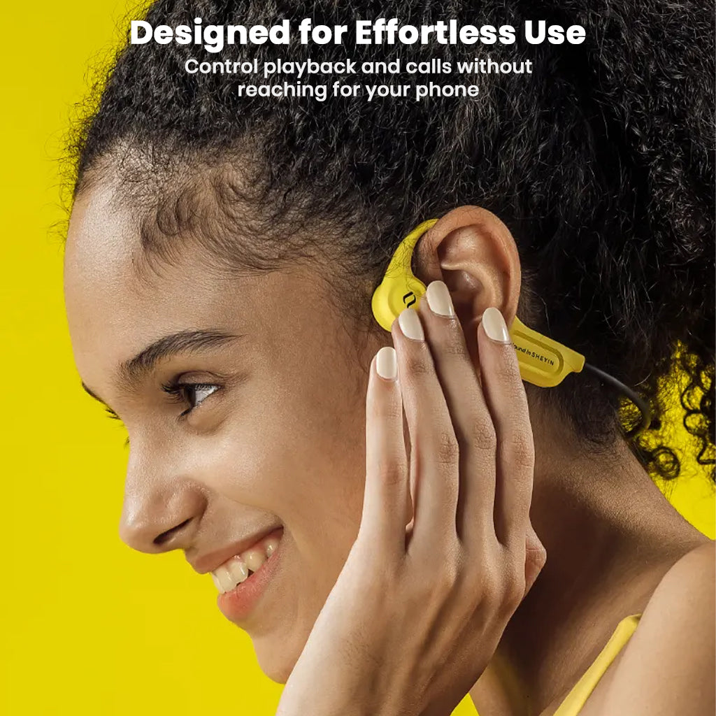 Woman adjusting yellow SHEYIN X5 headphones, showing intuitive controls for effortless music and call management.