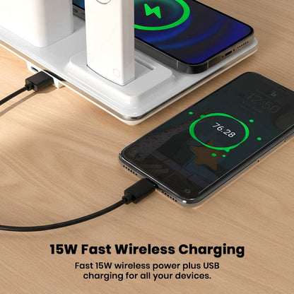 Close-up of TECPHILE Desk Lamp's 15W wireless charging pad and USB port charging a smartphone, ideal for multitasking workspaces.