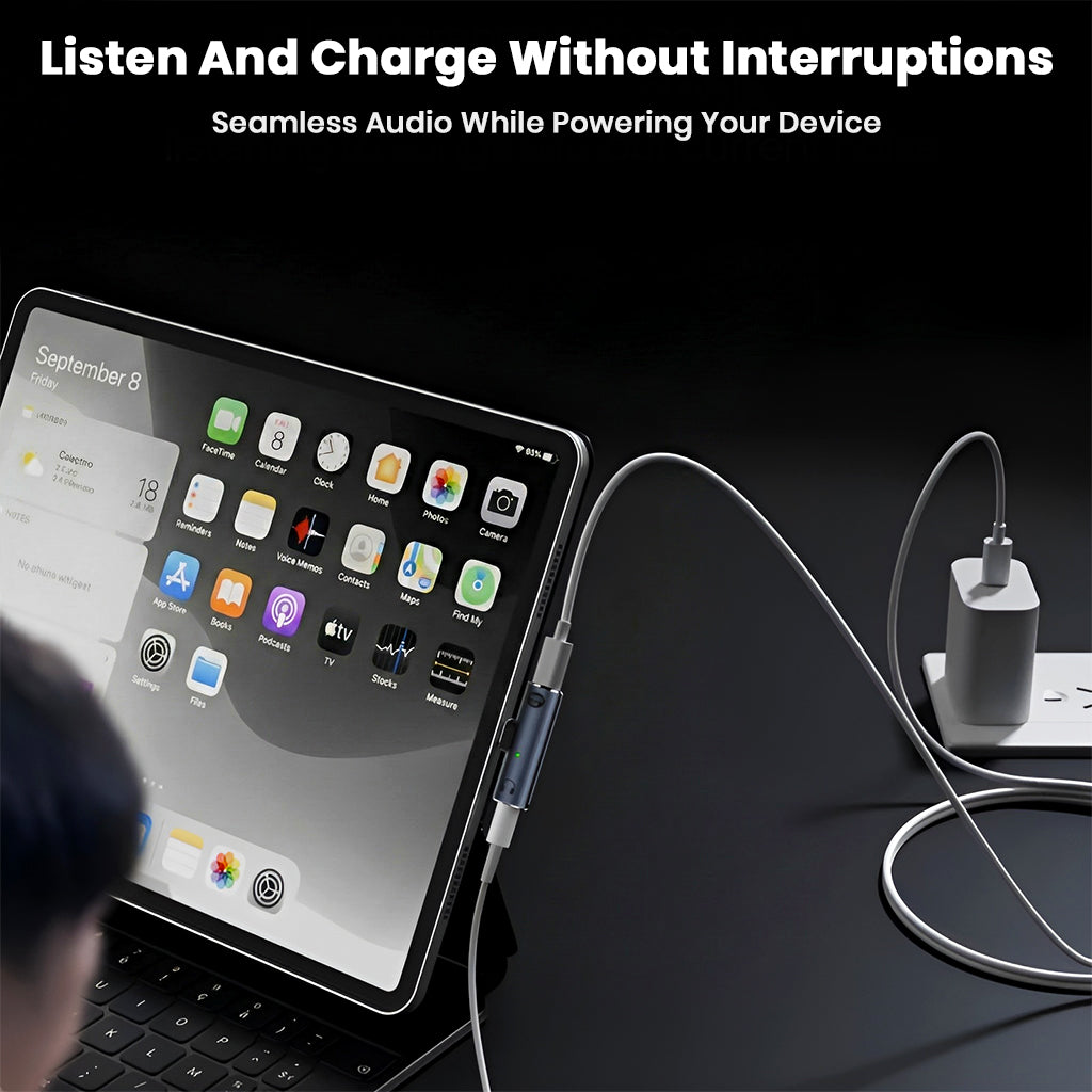 AUDIOCULAR A14X adapter used with a tablet, allowing seamless charging and audio output at the same time.
