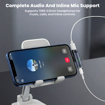 AUDIOCULAR A14X adapter connected to a phone during a call, supporting TRRS 3.5mm headphones with mic and controls.