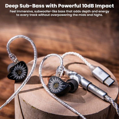 Close-up of black and silver in-ear monitors with custom design and cables