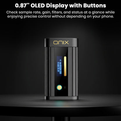 Close-up of the black ONIX portable audio device showing its small 0.87" OLED Display and control buttons. The screen displays 'UAC2.0' and audio status icons, with text overlay highlighting: "0.87" OLED Display with Buttons" for precise, phone-independent control.