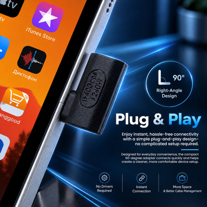 Person holding a compact USB-C adapter between fingers, demonstrating portable and space-saving design for travel convenience.